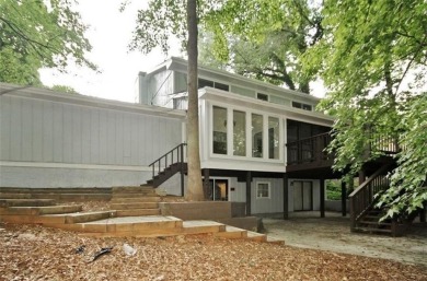 This charming 4-bedroom 3-bath home is perfect for a growing on Hidden Hills Country Club in Georgia - for sale on GolfHomes.com, golf home, golf lot