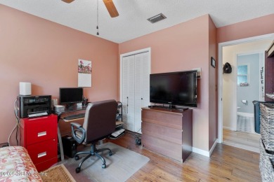Nestled in a serene setting, this charming home offers a perfect on Blue Cypress Golf Club in Florida - for sale on GolfHomes.com, golf home, golf lot