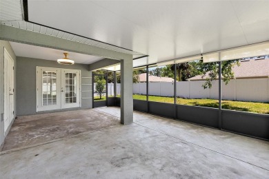 This lovely home is located in the very desirable Cypress Knoll on The Grand Club Cypress Course in Florida - for sale on GolfHomes.com, golf home, golf lot
