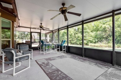 Nestled in a serene setting, this charming home offers a perfect on Blue Cypress Golf Club in Florida - for sale on GolfHomes.com, golf home, golf lot