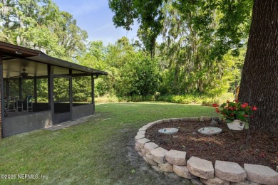 Nestled in a serene setting, this charming home offers a perfect on Blue Cypress Golf Club in Florida - for sale on GolfHomes.com, golf home, golf lot