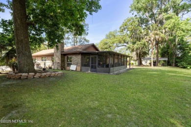 Nestled in a serene setting, this charming home offers a perfect on Blue Cypress Golf Club in Florida - for sale on GolfHomes.com, golf home, golf lot