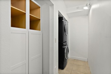 This lovely home is located in the very desirable Cypress Knoll on The Grand Club Cypress Course in Florida - for sale on GolfHomes.com, golf home, golf lot