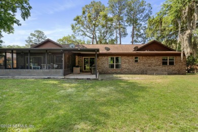 Nestled in a serene setting, this charming home offers a perfect on Blue Cypress Golf Club in Florida - for sale on GolfHomes.com, golf home, golf lot