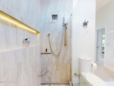 Welcome to your dream home. New roof 2024, Hot water heater 2022 on New Smyrna Beach Golf Course in Florida - for sale on GolfHomes.com, golf home, golf lot