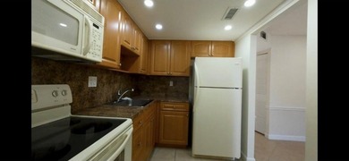 **55+ Community Nice kitchen- spectacular closet in bedroom- on Sunrise Lakes Phase III in Florida - for sale on GolfHomes.com, golf home, golf lot