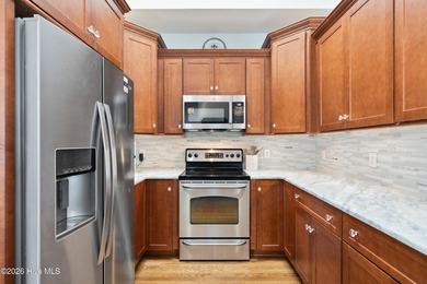 This immaculate, 3BR/2BA home is absolutely adorable. You will on Carolina National Golf Club in North Carolina - for sale on GolfHomes.com, golf home, golf lot