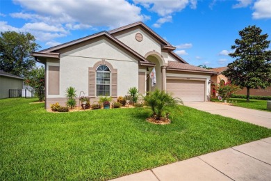 Welcome to 13523 Meadow Golf Ave, a beautifully maintained on Meadow Oaks Golf and Country Club in Florida - for sale on GolfHomes.com, golf home, golf lot