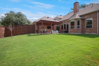 This thoughtfully renovated home offers a stylish blend of on Hackberry Creek Country Club in Texas - for sale on GolfHomes.com, golf home, golf lot