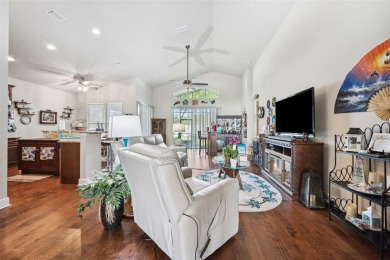Welcome to 13523 Meadow Golf Ave, a beautifully maintained on Meadow Oaks Golf and Country Club in Florida - for sale on GolfHomes.com, golf home, golf lot