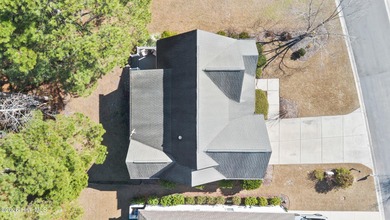 This immaculate, 3BR/2BA home is absolutely adorable. You will on Carolina National Golf Club in North Carolina - for sale on GolfHomes.com, golf home, golf lot