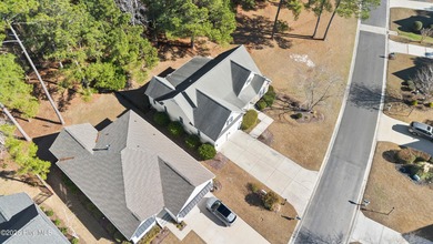 This immaculate, 3BR/2BA home is absolutely adorable. You will on Carolina National Golf Club in North Carolina - for sale on GolfHomes.com, golf home, golf lot