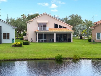 PRICE REDUCED!! LAKEFRONT LUXURY in Prestigious Bayou Club on Bayou Golf Club in Florida - for sale on GolfHomes.com, golf home, golf lot