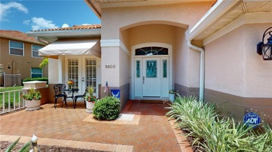 PRICE REDUCED!! LAKEFRONT LUXURY in Prestigious Bayou Club on Bayou Golf Club in Florida - for sale on GolfHomes.com, golf home, golf lot