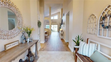 PRICE REDUCED!! LAKEFRONT LUXURY in Prestigious Bayou Club on Bayou Golf Club in Florida - for sale on GolfHomes.com, golf home, golf lot