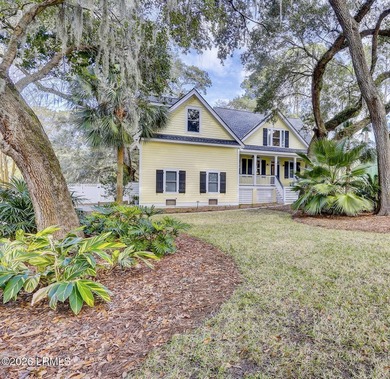 Nestled on a quiet street beneath stunning live oaks, this on The Golf Club at Pleasant Point Plantation in South Carolina - for sale on GolfHomes.com, golf home, golf lot