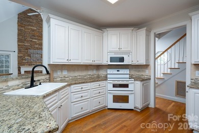 Don't miss this charming cottage with serene lake views in the on Old North State Club at Uwharrie Point Golf community in North Carolina - for sale on GolfHomes.com, golf home, golf lot