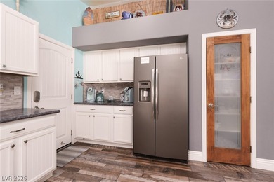 LOCATED IN THE DESIRABLE GUARD-GATED GOLF COURSE COMMUNITY OF on Stallion Mountain Golf Course in Nevada - for sale on GolfHomes.com, golf home, golf lot