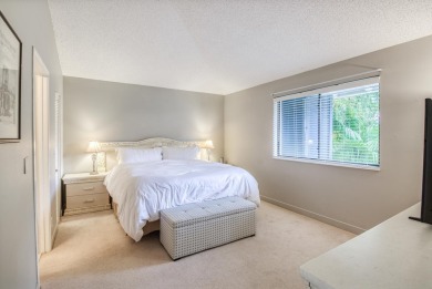 Discover this beautifully updated 2-bedroom, 2-bathroom home in on PGA National Golf Club in Florida - for sale on GolfHomes.com, golf home, golf lot