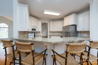 Don't miss this charming cottage with serene lake views in the on Old North State Club at Uwharrie Point Golf community in North Carolina - for sale on GolfHomes.com, golf home, golf lot