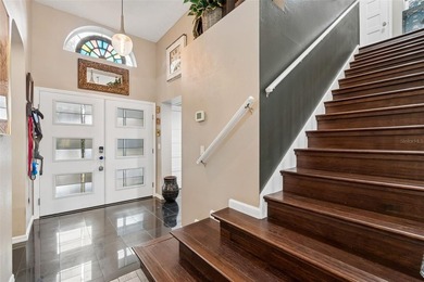 Tucked within the guard-gated community of Hunter's Green on Hunters Green Country Club in Florida - for sale on GolfHomes.com, golf home, golf lot