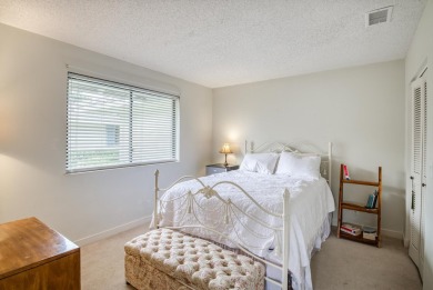Discover this beautifully updated 2-bedroom, 2-bathroom home in on PGA National Golf Club in Florida - for sale on GolfHomes.com, golf home, golf lot