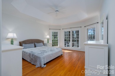 Don't miss this charming cottage with serene lake views in the on Old North State Club at Uwharrie Point Golf community in North Carolina - for sale on GolfHomes.com, golf home, golf lot