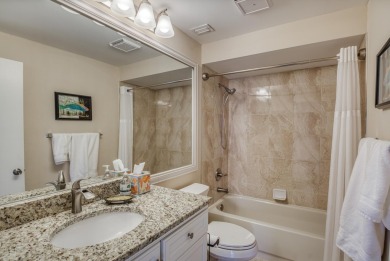 Discover this beautifully updated 2-bedroom, 2-bathroom home in on PGA National Golf Club in Florida - for sale on GolfHomes.com, golf home, golf lot