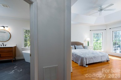 Don't miss this charming cottage with serene lake views in the on Old North State Club at Uwharrie Point Golf community in North Carolina - for sale on GolfHomes.com, golf home, golf lot