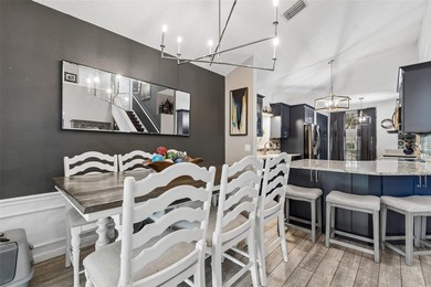 Tucked within the guard-gated community of Hunter's Green on Hunters Green Country Club in Florida - for sale on GolfHomes.com, golf home, golf lot