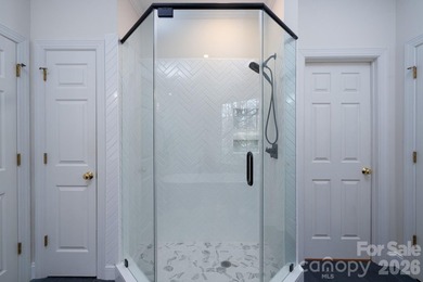 Don't miss this charming cottage with serene lake views in the on Old North State Club at Uwharrie Point Golf community in North Carolina - for sale on GolfHomes.com, golf home, golf lot