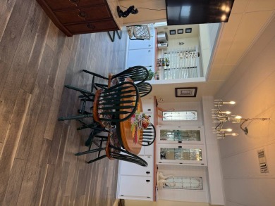 This lovely, manufactured home on leased land.   Priced to sell on Pine Lakes Country Club in Florida - for sale on GolfHomes.com, golf home, golf lot