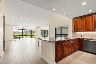 Pinnacle top-floor residence in Eastgate boasting panoramic on Hunters Run Golf and Country Club in Florida - for sale on GolfHomes.com, golf home, golf lot