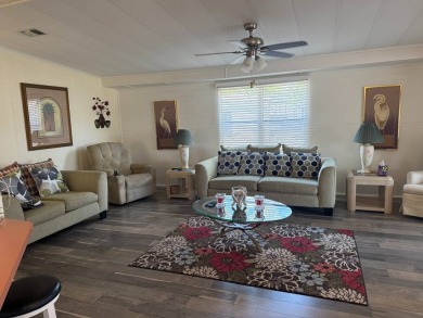This lovely, manufactured home on leased land.   Priced to sell on Pine Lakes Country Club in Florida - for sale on GolfHomes.com, golf home, golf lot