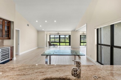 Pinnacle top-floor residence in Eastgate boasting panoramic on Hunters Run Golf and Country Club in Florida - for sale on GolfHomes.com, golf home, golf lot