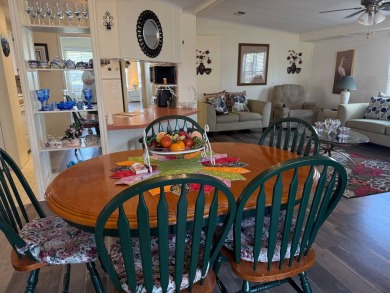 This lovely, manufactured home on leased land.   Priced to sell on Pine Lakes Country Club in Florida - for sale on GolfHomes.com, golf home, golf lot