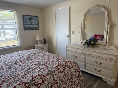 This lovely, manufactured home on leased land.   Priced to sell on Pine Lakes Country Club in Florida - for sale on GolfHomes.com, golf home, golf lot