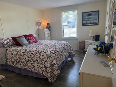 This lovely, manufactured home on leased land.   Priced to sell on Pine Lakes Country Club in Florida - for sale on GolfHomes.com, golf home, golf lot