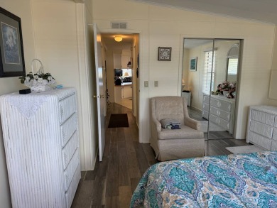 This lovely, manufactured home on leased land.   Priced to sell on Pine Lakes Country Club in Florida - for sale on GolfHomes.com, golf home, golf lot