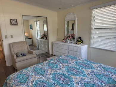 This lovely, manufactured home on leased land.   Priced to sell on Pine Lakes Country Club in Florida - for sale on GolfHomes.com, golf home, golf lot