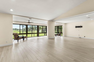 Pinnacle top-floor residence in Eastgate boasting panoramic on Hunters Run Golf and Country Club in Florida - for sale on GolfHomes.com, golf home, golf lot