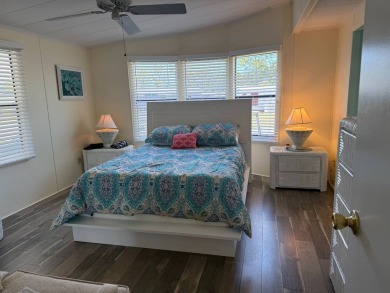 This lovely, manufactured home on leased land.   Priced to sell on Pine Lakes Country Club in Florida - for sale on GolfHomes.com, golf home, golf lot