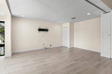 Pinnacle top-floor residence in Eastgate boasting panoramic on Hunters Run Golf and Country Club in Florida - for sale on GolfHomes.com, golf home, golf lot