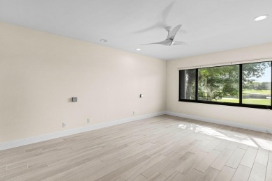 Pinnacle top-floor residence in Eastgate boasting panoramic on Hunters Run Golf and Country Club in Florida - for sale on GolfHomes.com, golf home, golf lot