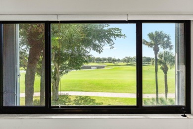 Pinnacle top-floor residence in Eastgate boasting panoramic on Hunters Run Golf and Country Club in Florida - for sale on GolfHomes.com, golf home, golf lot