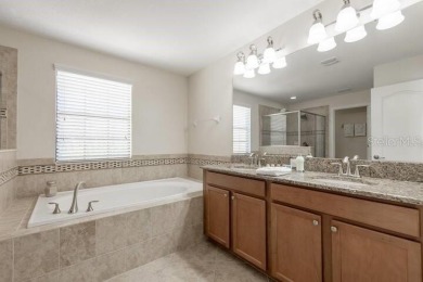 Experience resort-style living at its finest in this fully on The Oasis Club at Champions Gate in Florida - for sale on GolfHomes.com, golf home, golf lot