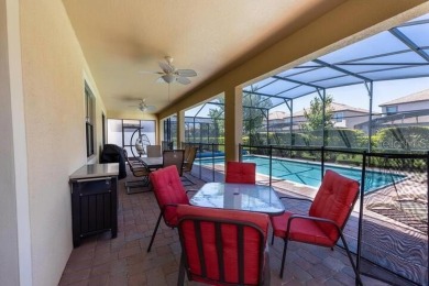 Experience resort-style living at its finest in this fully on The Oasis Club at Champions Gate in Florida - for sale on GolfHomes.com, golf home, golf lot