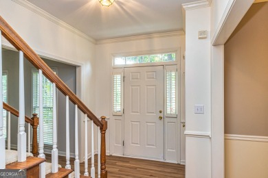 Step into your future in the beautiful Tamerlane neighborhood on Braelinn Golf Club in Georgia - for sale on GolfHomes.com, golf home, golf lot