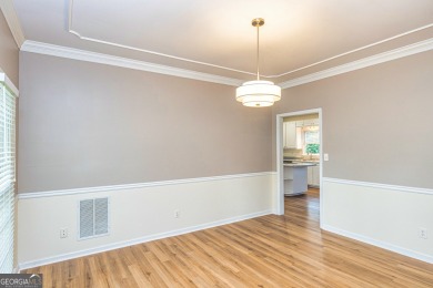Step into your future in the beautiful Tamerlane neighborhood on Braelinn Golf Club in Georgia - for sale on GolfHomes.com, golf home, golf lot