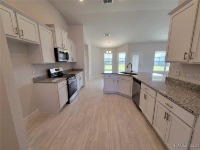 THIS HOME QUALIFIES FOR A LOW INTEREST RATE BUYDOWN WHEN BUYER on Citrus Springs Country Club in Florida - for sale on GolfHomes.com, golf home, golf lot